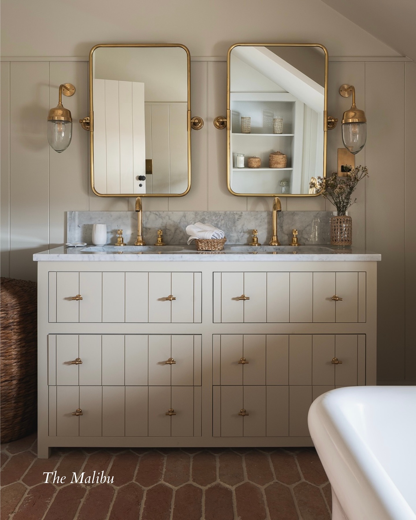 The Malibu Double Vanity in soft white with brass hardware